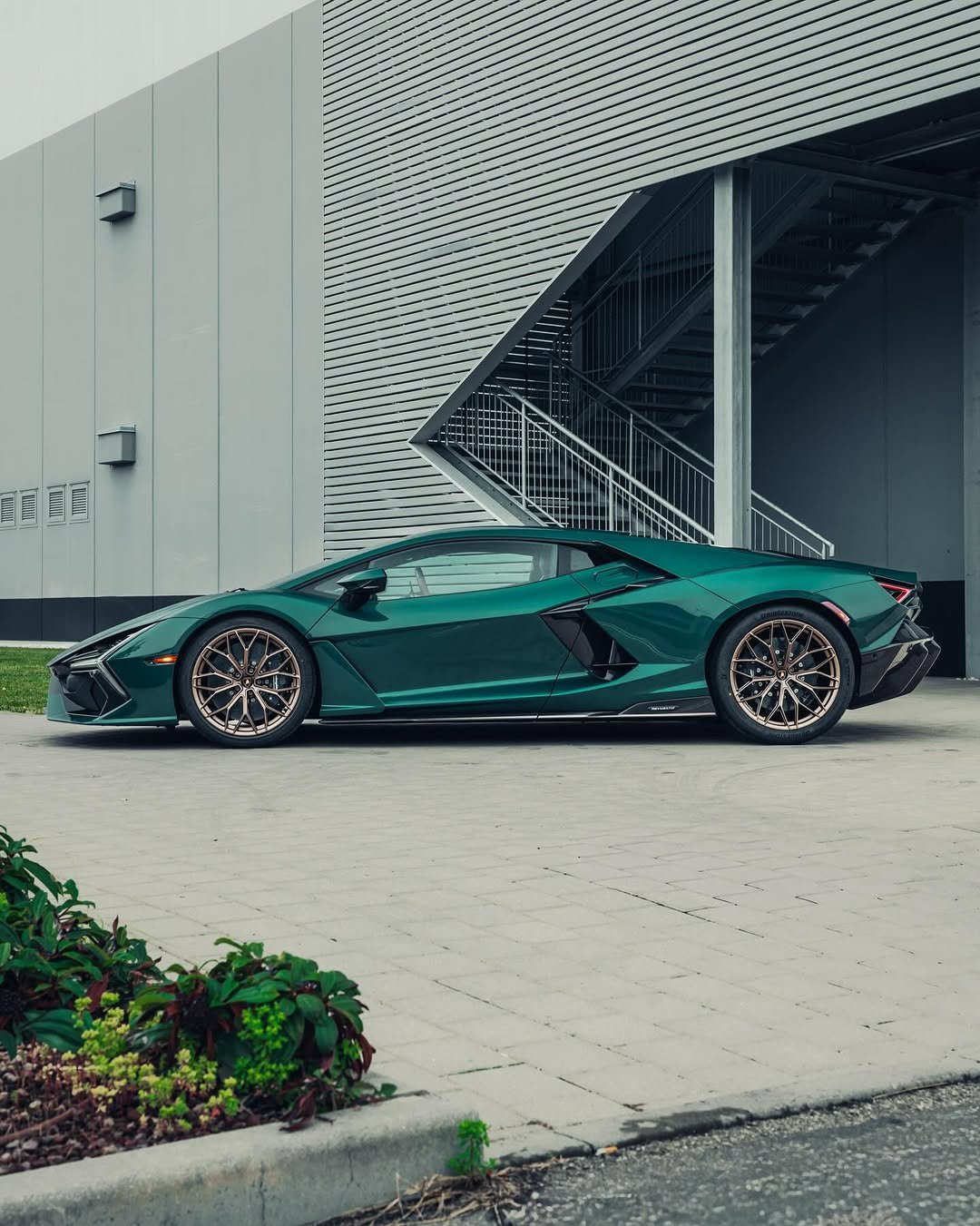 Photo by Lamborghini on December 24, 2025. May be an image of race car, wheel, roadster, road and text.