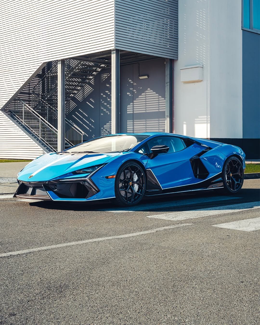 Photo by Lamborghini on January 02, 2026. May be an image of roadster, race car, wheel, road and text.