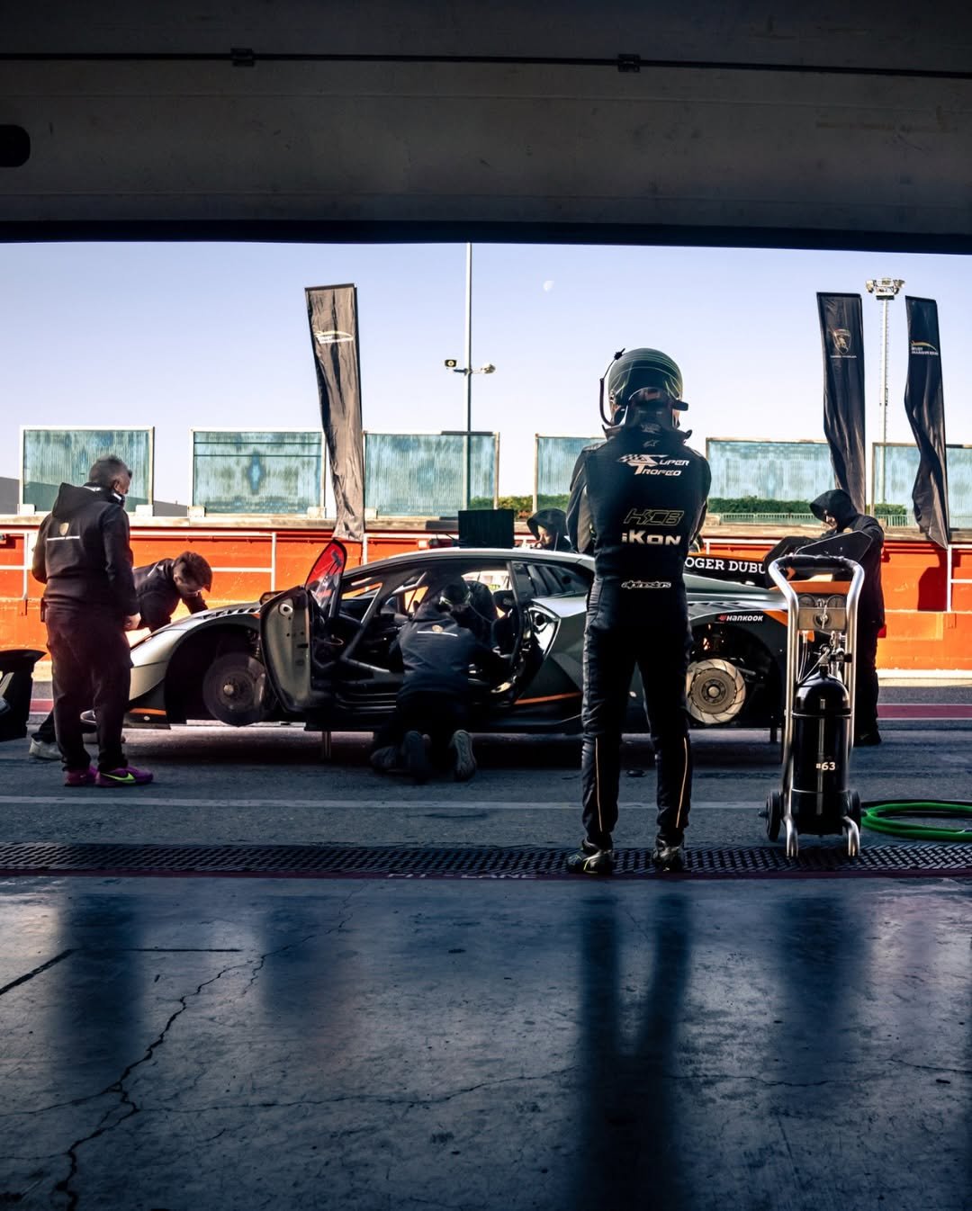 Photo by Lamborghini Squadra Corse on January 02, 2026. May be an image of racing vehicles, race car, helmet and text that says 'ha iK iKON OGER DUBT 63'.