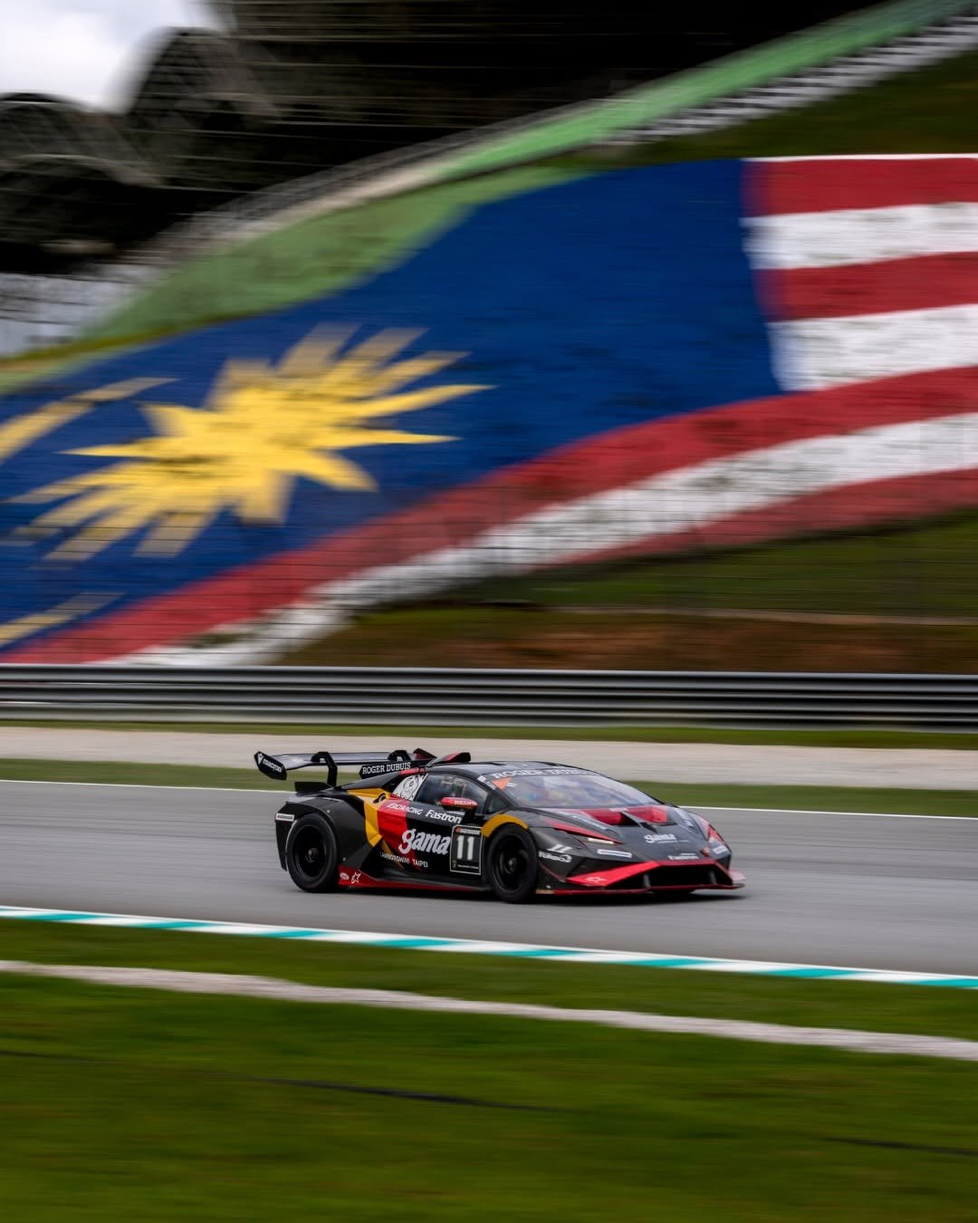 Photo shared by Lamborghini Squadra Corse on April 22, 2026 tagging @lamborghini. May be an image of racing vehicles, race car and text.