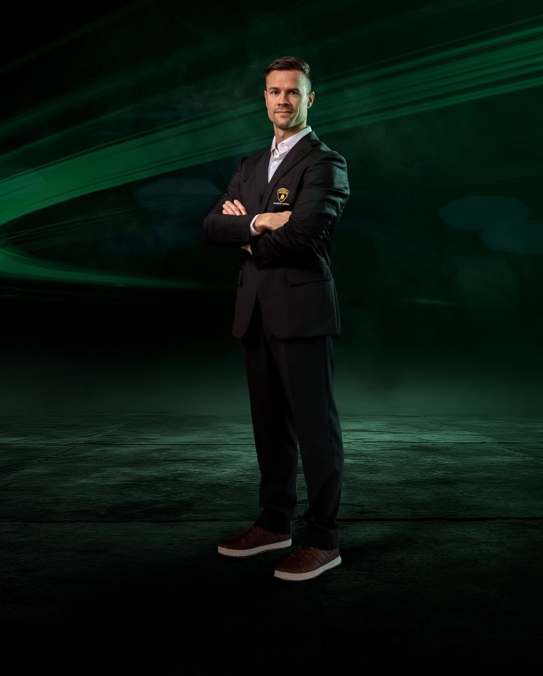 Photo shared by Lamborghini Squadra Corse on December 17, 2025 tagging @patric_niederhauser. May be an image of one or more people, suit, poster, dinner jacket, costume, blazer and text.