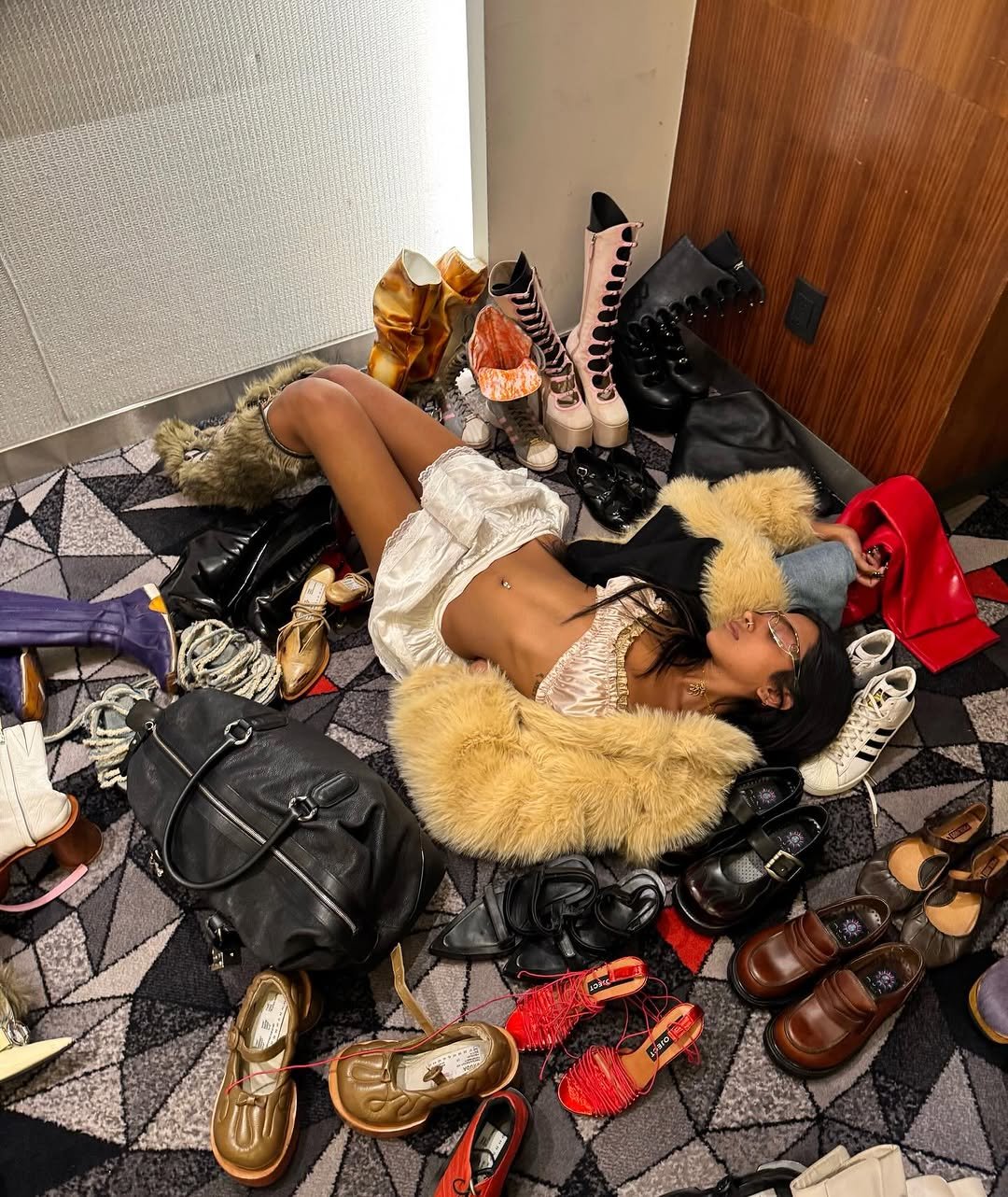 Photo by LARA RAJ on March 12, 2026. May be an image of one or more people, makeup, shoes, fur coat and text.