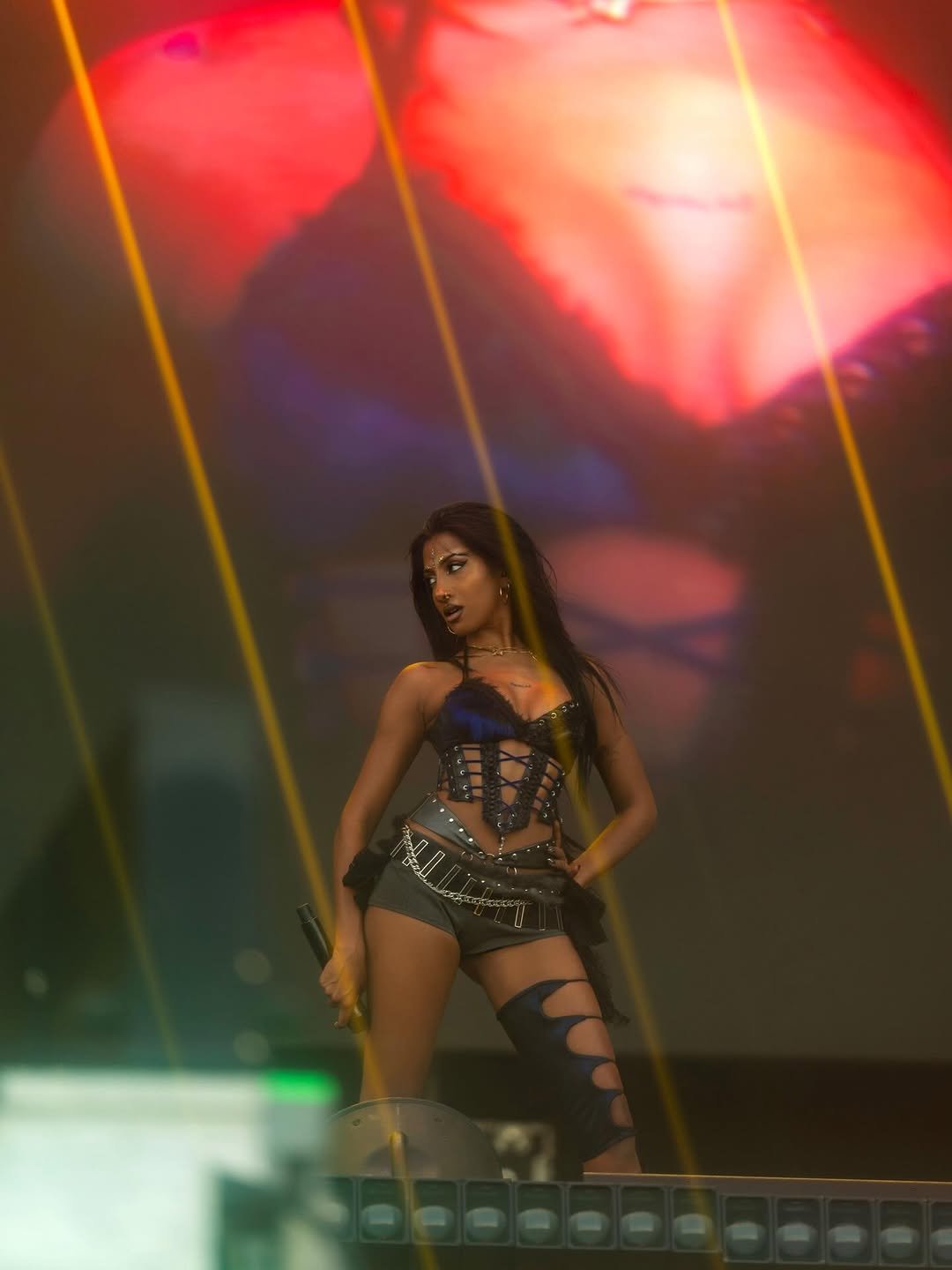 Photo by LARA RAJ on March 16, 2026. May be an image of fishnet stockings, costume and text.