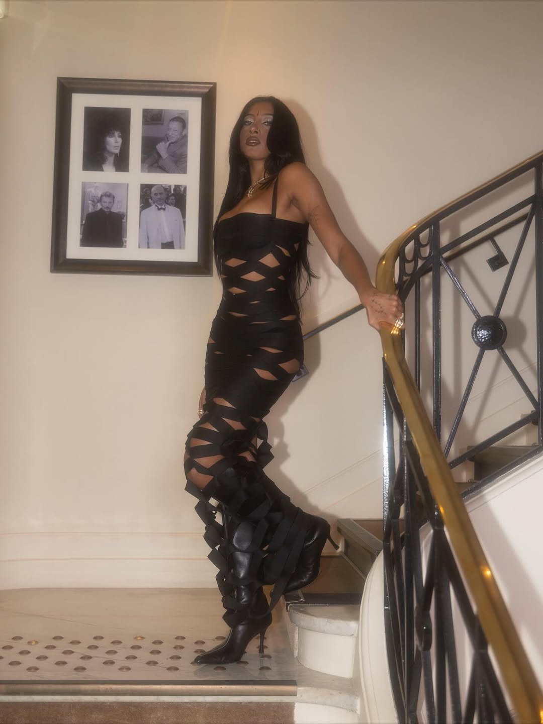 Photo shared by LARA RAJ on November 01, 2025 tagging @rahulb91, and @alexanderwangny. May be an image of leather, fishnet stockings, dress and text.