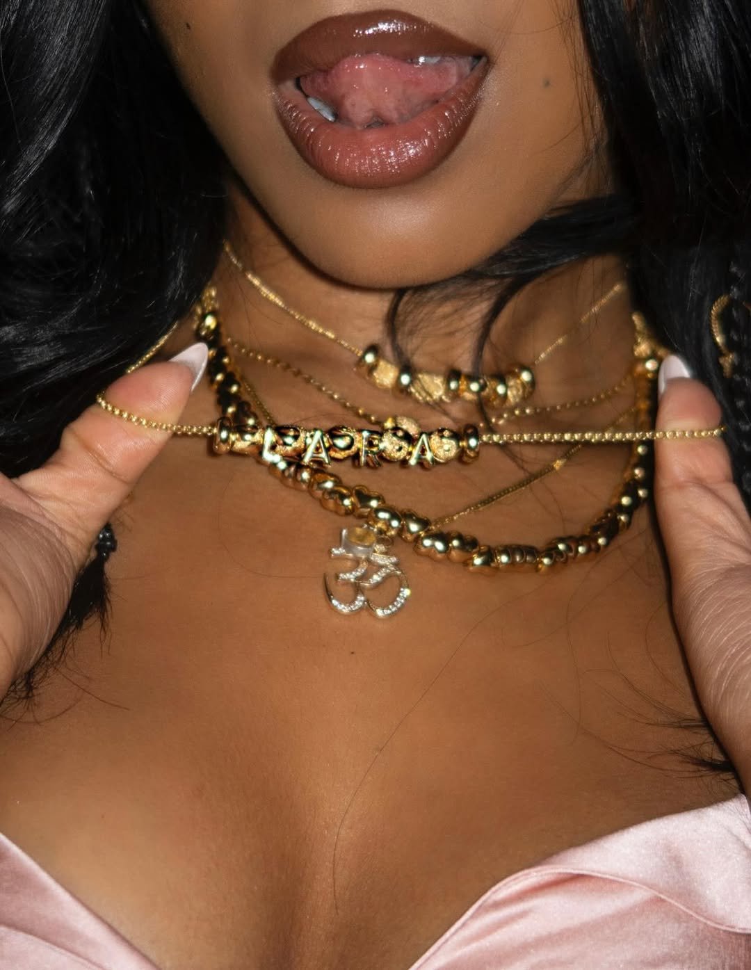 Photo by LARA RAJ on January 15, 2026. May be an image of one or more people, makeup, necklace, choker and text.