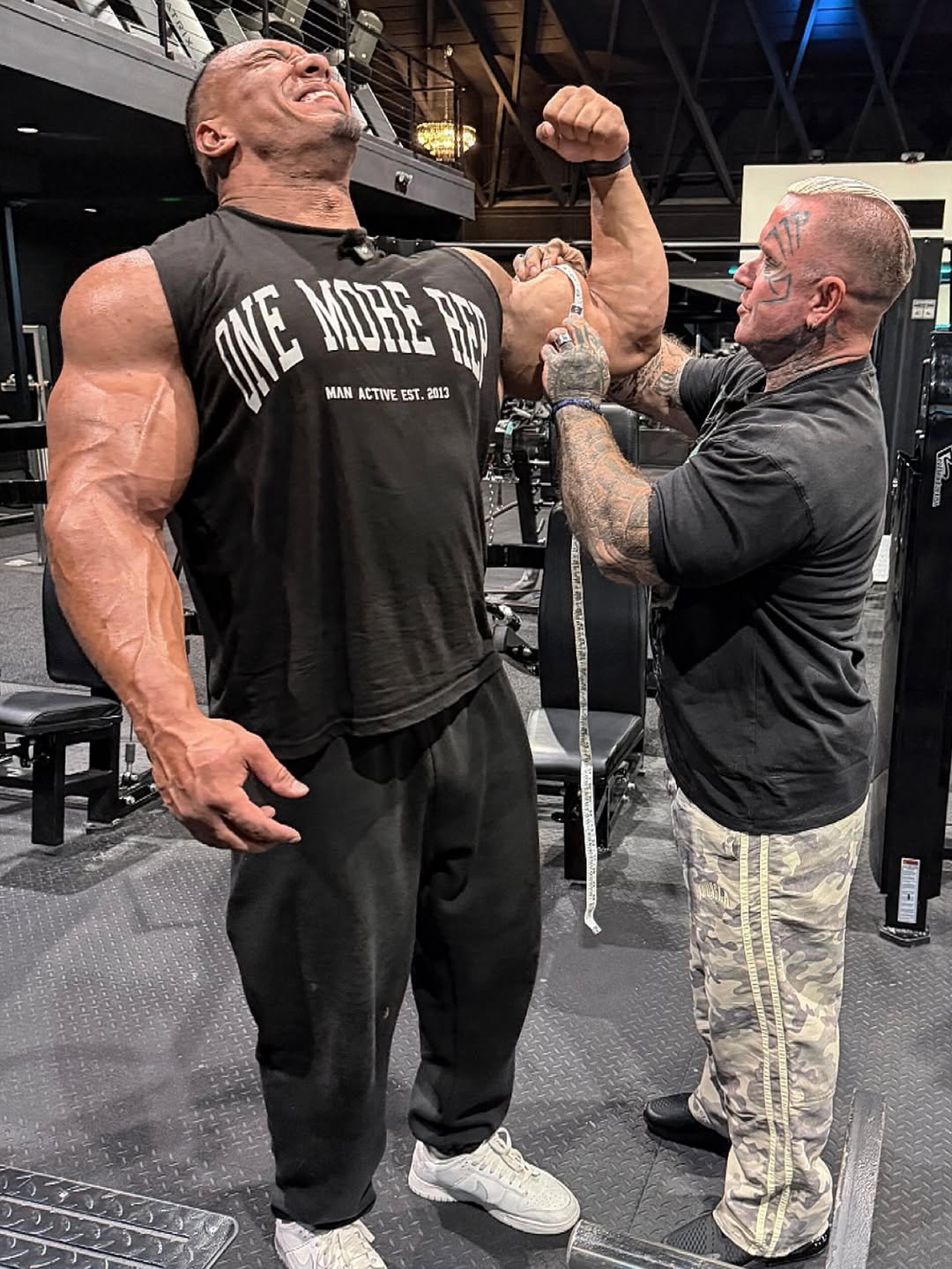 Photo shared by Larry on January 12, 2026 tagging @boohoomanactive, and @onegengym. May be an image of one or more people, biceps, people bodybuilding, people standing and text.