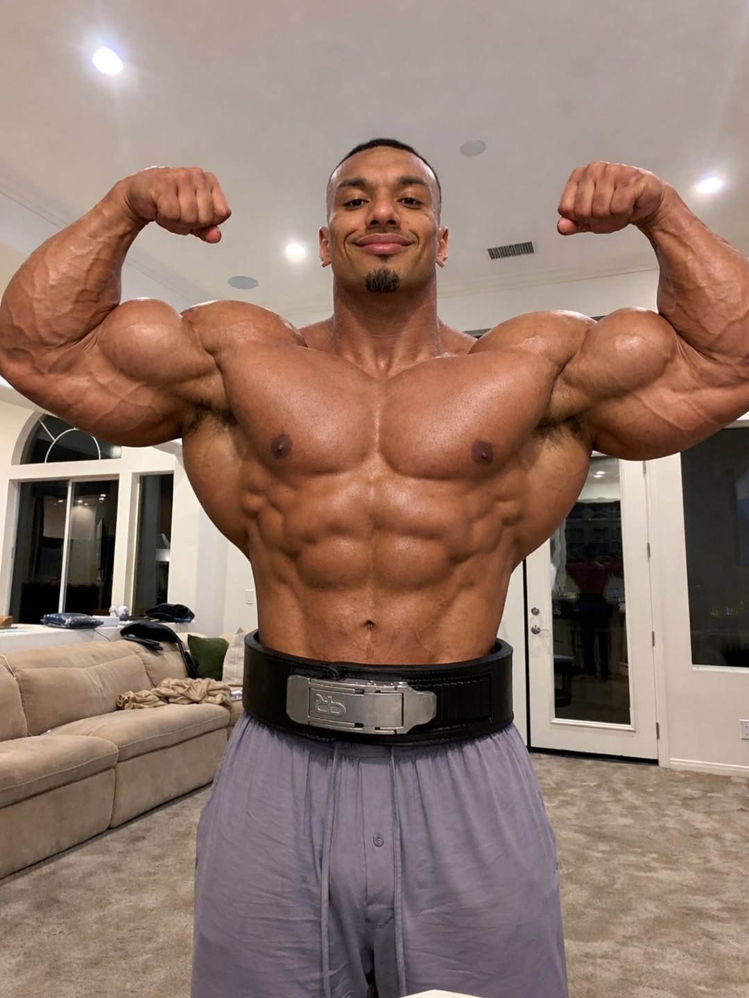 Photo by Larry on December 22, 2025. May be an image of one or more people, biceps, people bodybuilding and text.