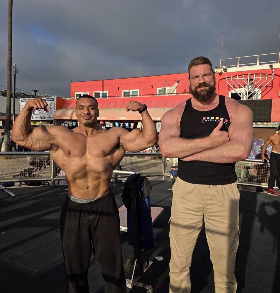 Photo shared by Larry on December 15, 2025 tagging @thedutchgiant. May be an image of one or more people, biceps, people bodybuilding and text.