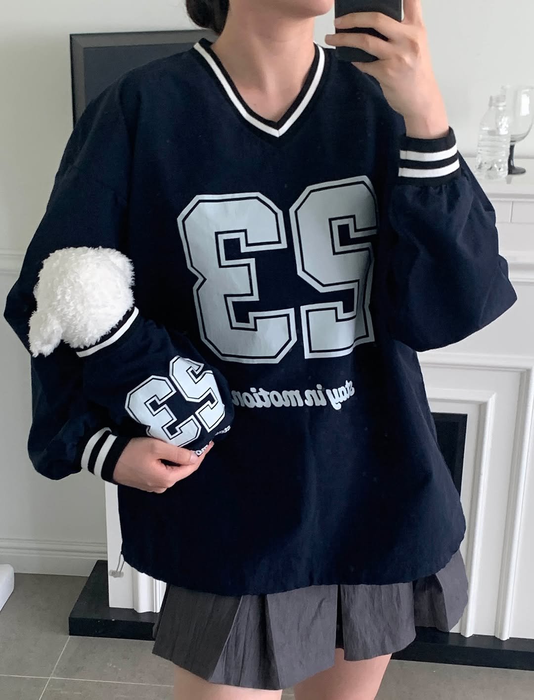Photo by 앤헤일리 • 강아지옷 on September 30, 2025. May be an image of 1 person, sweatshirt, miniskirt and text.
