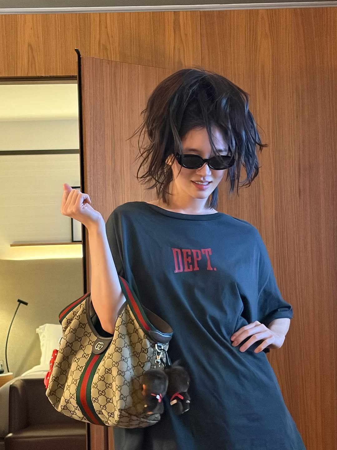 Photo shared by 박규영 on September 23, 2025 tagging @gucci. May be an image of 1 person, eyewear, fishnet stockings and text.