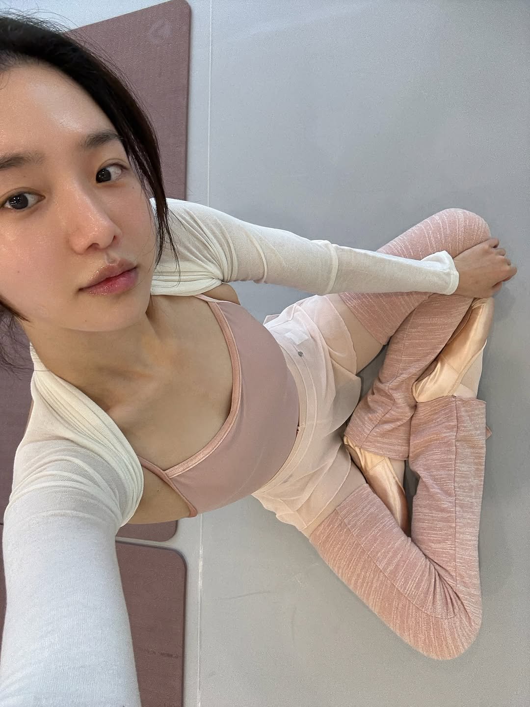 Photo by 박규영 on August 28, 2025. May be an image of 1 person, practicing yoga, activewear, turtleneck and text.