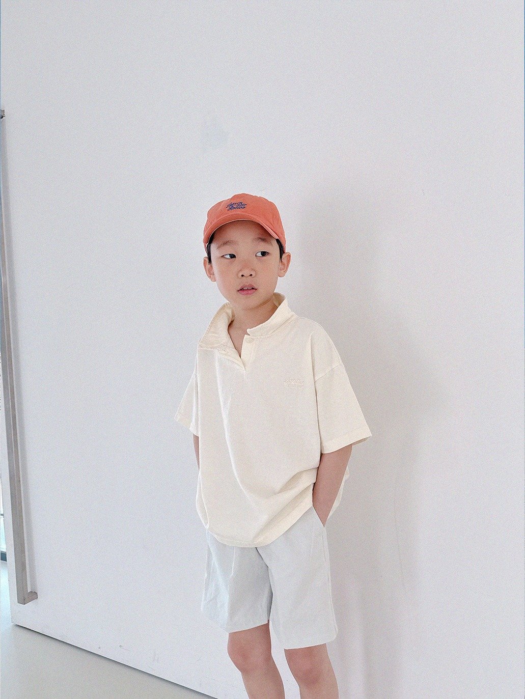 Photo by Lazy Day Routine on April 18, 2026. May be an image of child, hat, shorts and text.