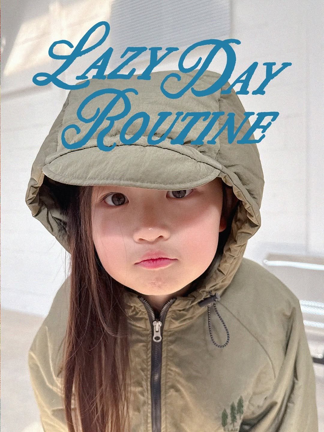 Photo by Lazy Day Routine on February 18, 2026. May be an image of child, duffle coat, hat, jacket, fleece, raincoat, parka, sweatshirt and text that says 'Lazy LszyDar DAy ROUTINB'.
