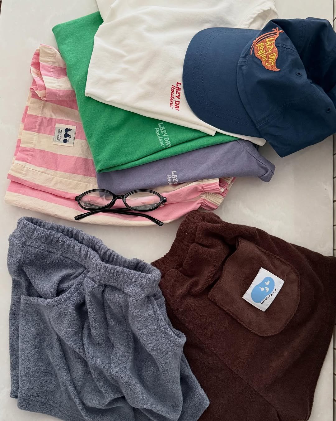 Photo by Lazy Day Routine on June 20, 2025. May be an image of towel, hat, fleece and text.