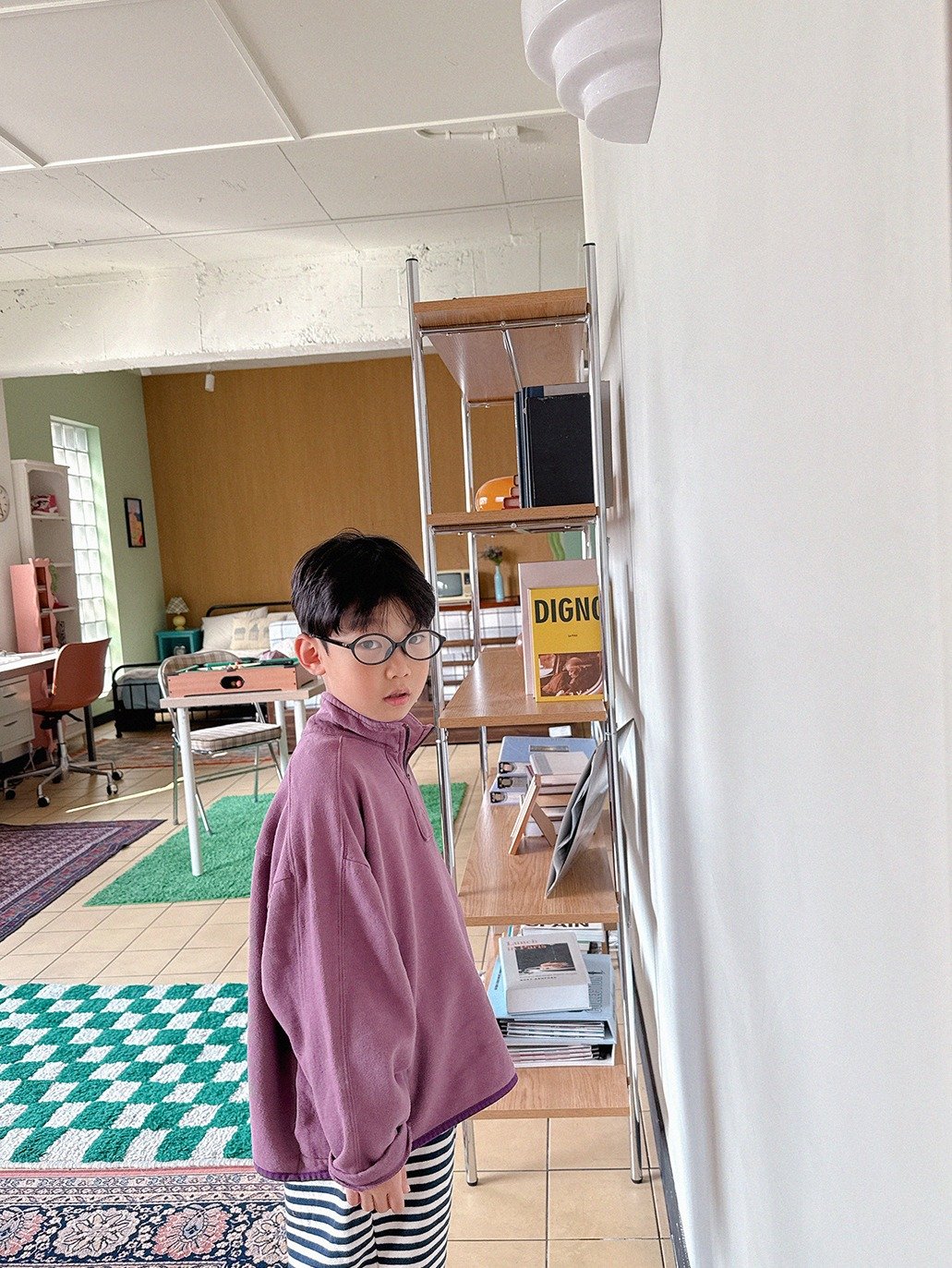 Photo by Lazy Day Routine on October 28, 2025. May be an image of child, standing, duffle coat, bath robe, hospital and text.