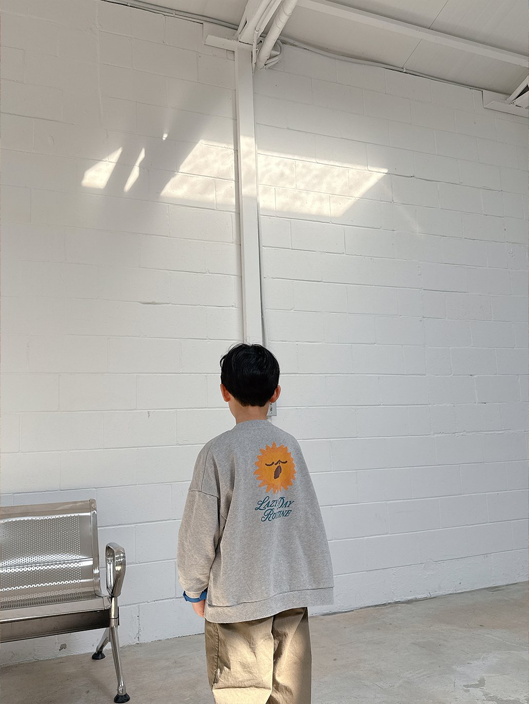 Photo by Lazy Day Routine on February 11, 2026. May be an image of standing, duffle coat, skateboard and text.