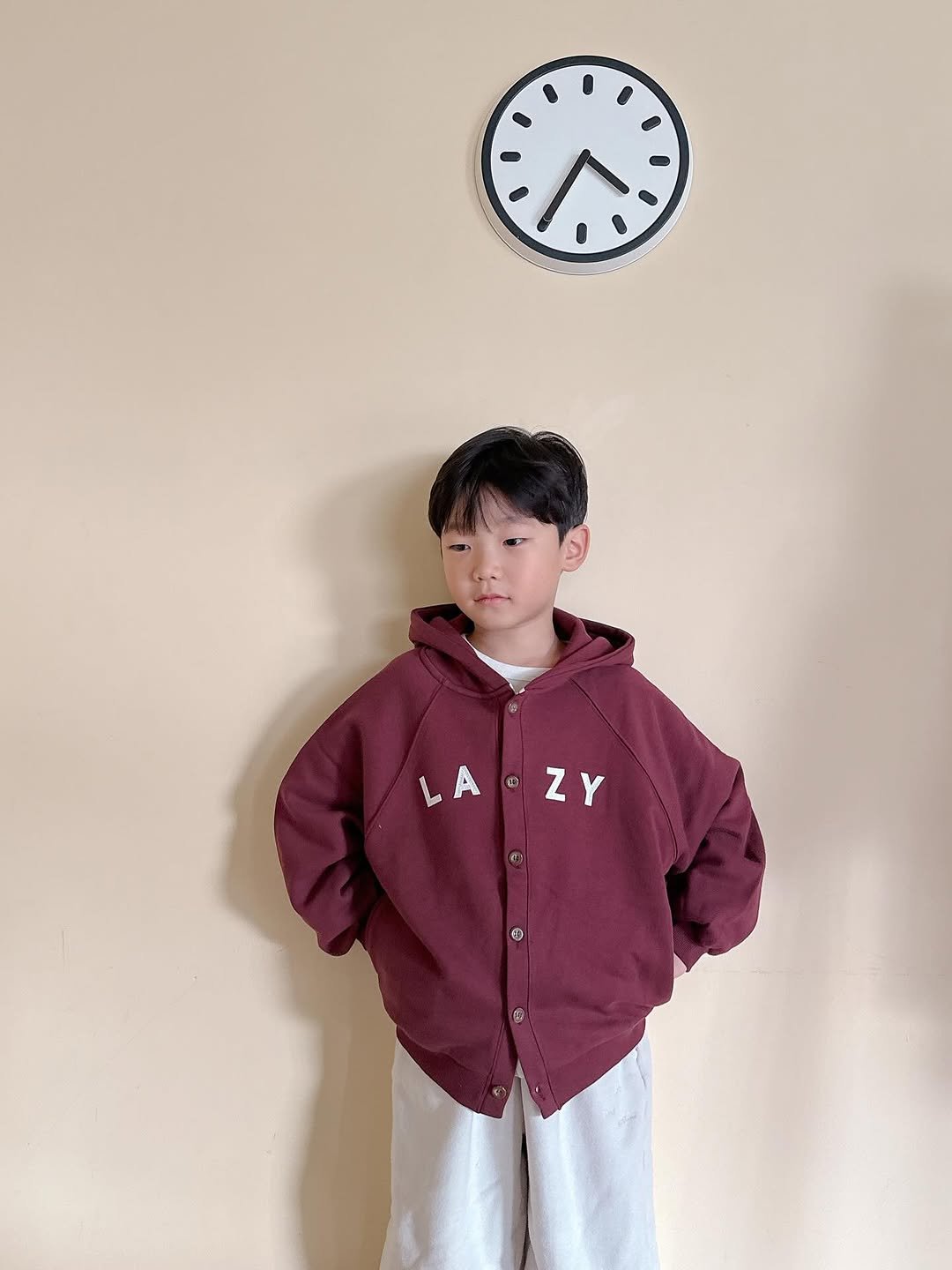 Photo by Lazy Day Routine on November 03, 2025. May be an image of child, duffle coat, jacket, timer and text that says 'LA.ZY A LA ® yZ ® ប ZY'.