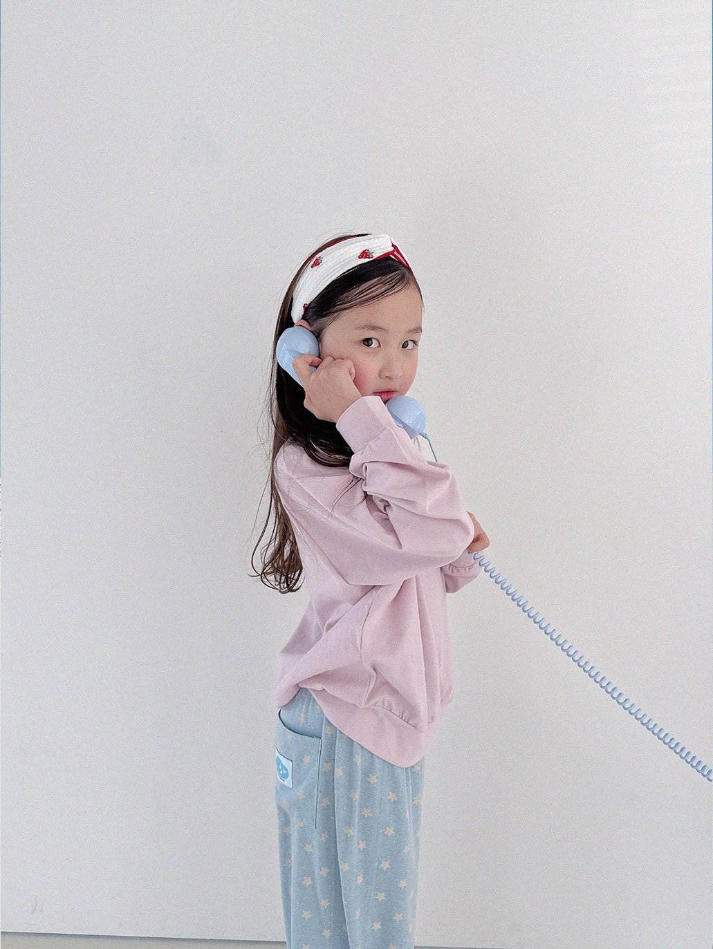 Photo by Lazy Day Routine on April 14, 2026. May be an image of baby, duffle coat, sleepwear, phone, drawstring, bath robe, portable cassette player and text.