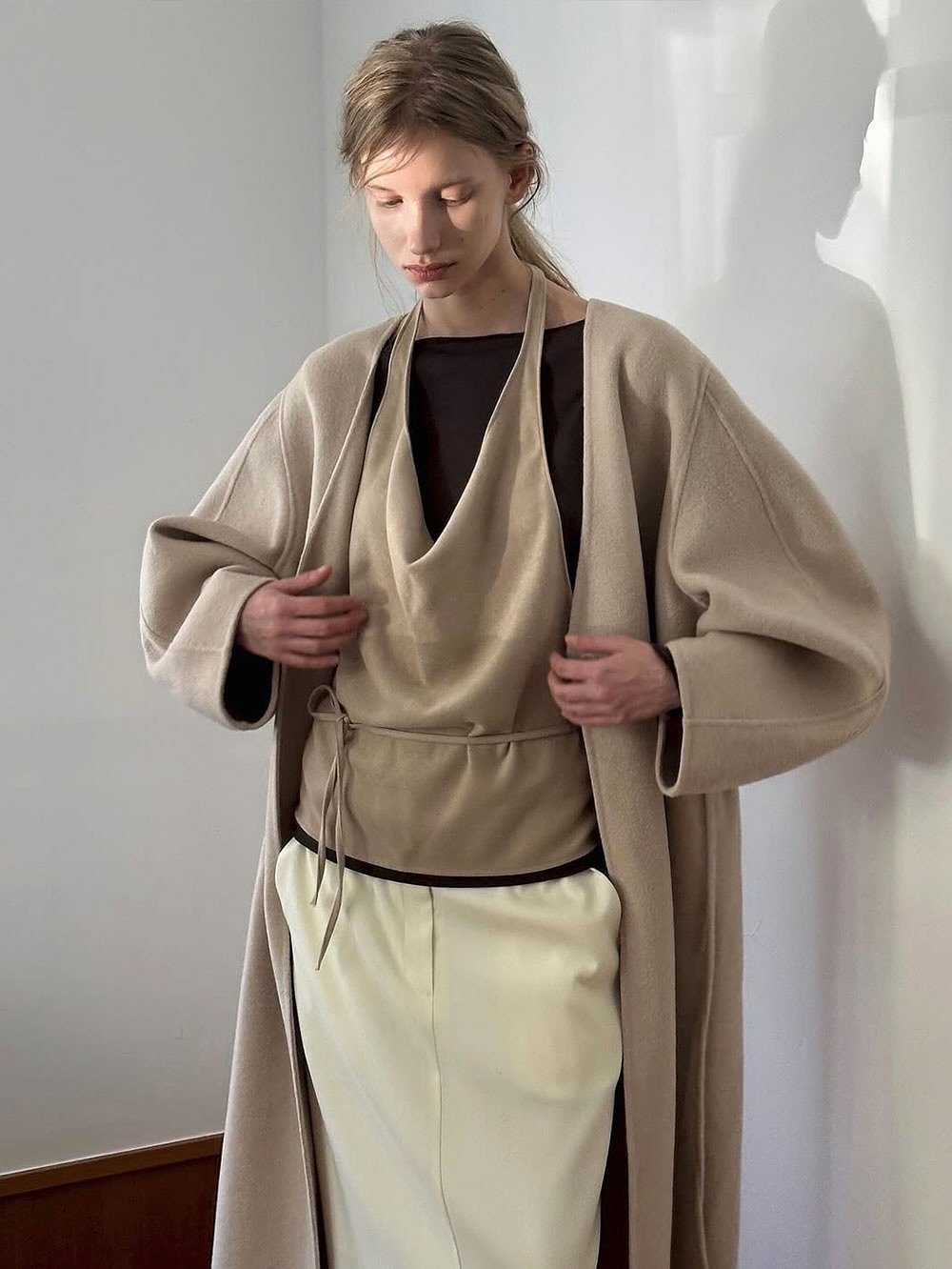 Photo by LECLE on October 31, 2025. May be an image of cloak, costume, bath robe, robe and text.