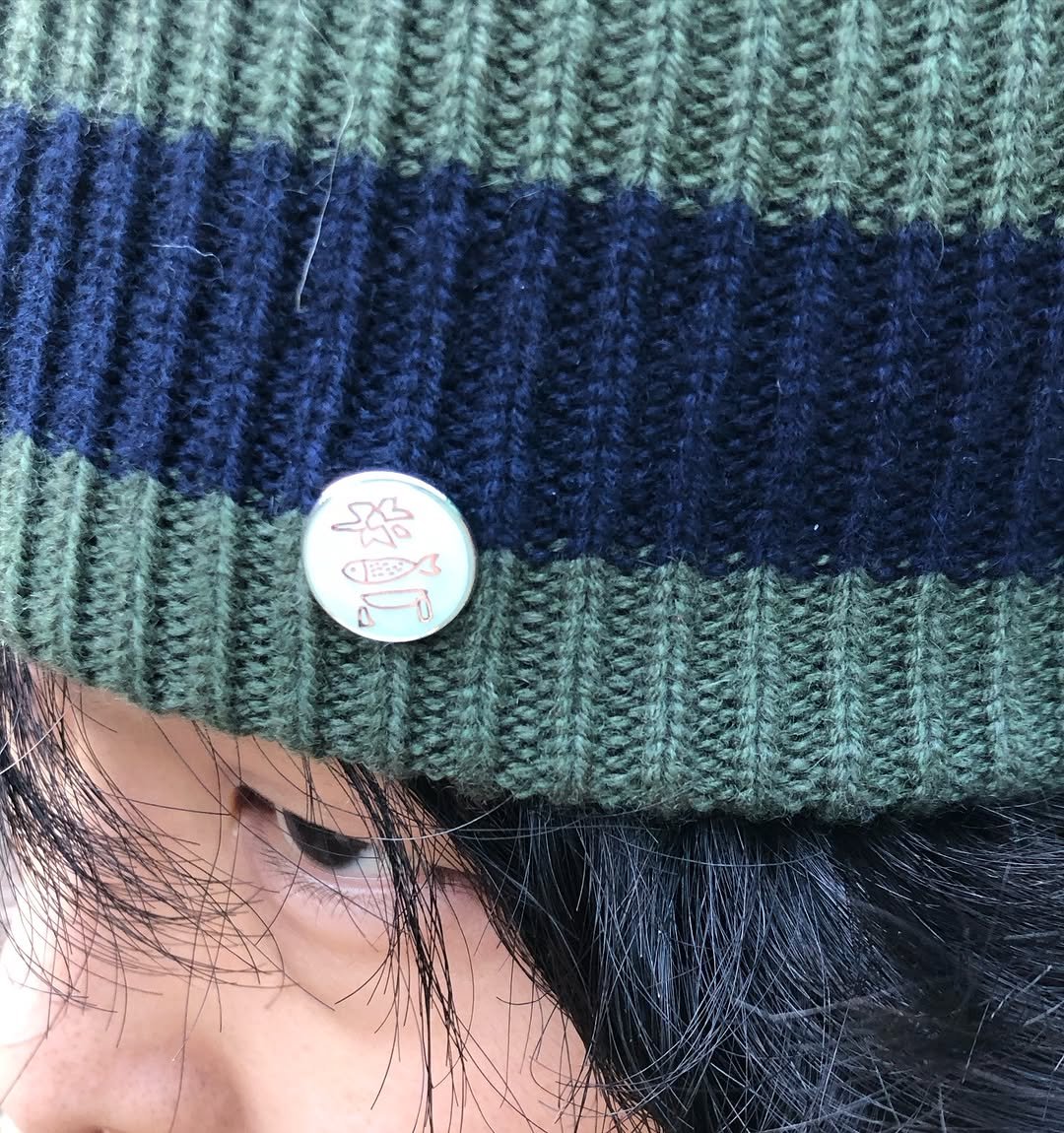 Photo shared by 이찬혁 on January 21, 2026 tagging @cemterofinspiration. May be an image of button, duffle coat, hat, beret, parka and text.