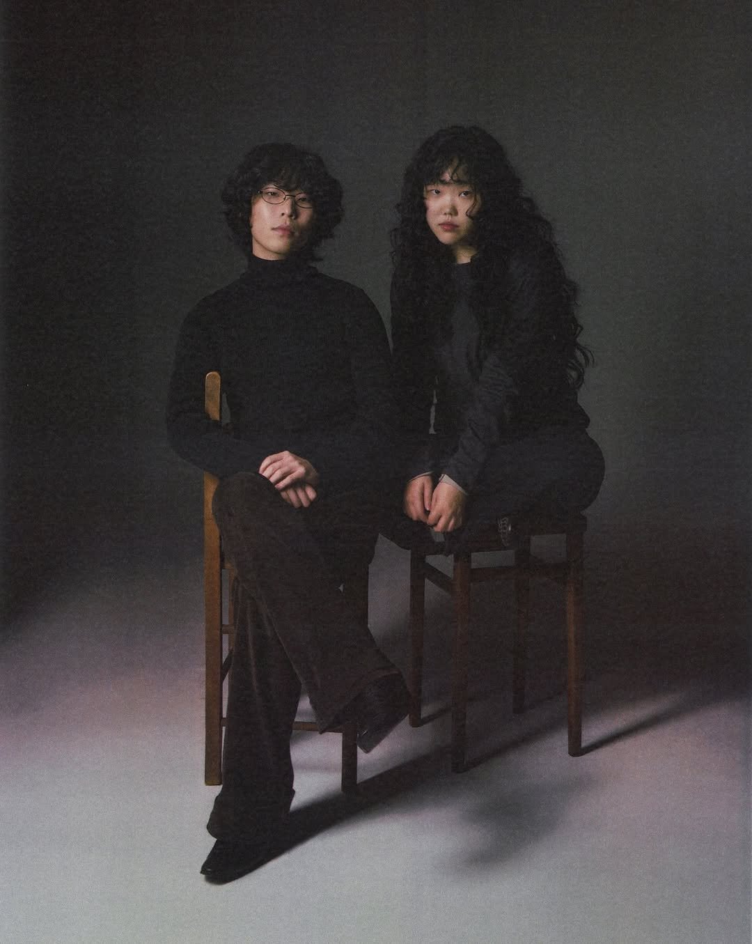 Photo shared by AKMU on February 02, 2026 tagging @leechanhyuk, @akmu_suhyun, and @cemterofinspiration. May be an image of one or more people and turtleneck.