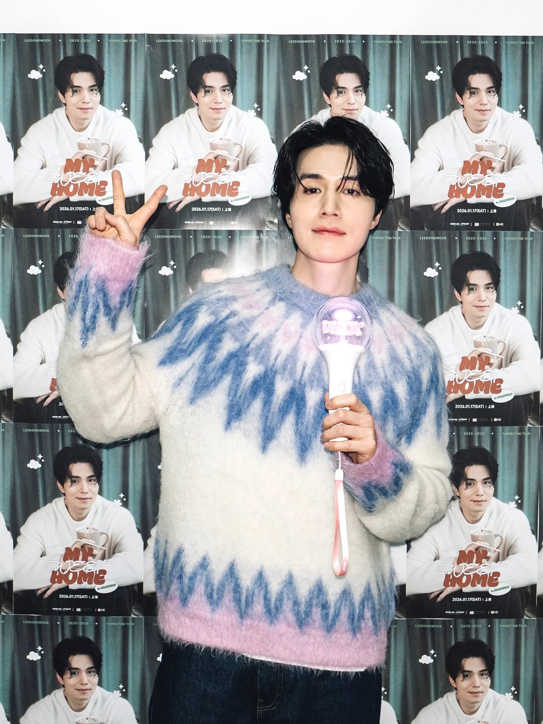 Photo by 이동욱 (Official_Instagram) on January 17, 2026. May be an image of one or more people, bangs, makeup, top, sweater, turtleneck, poster, magazine and text.