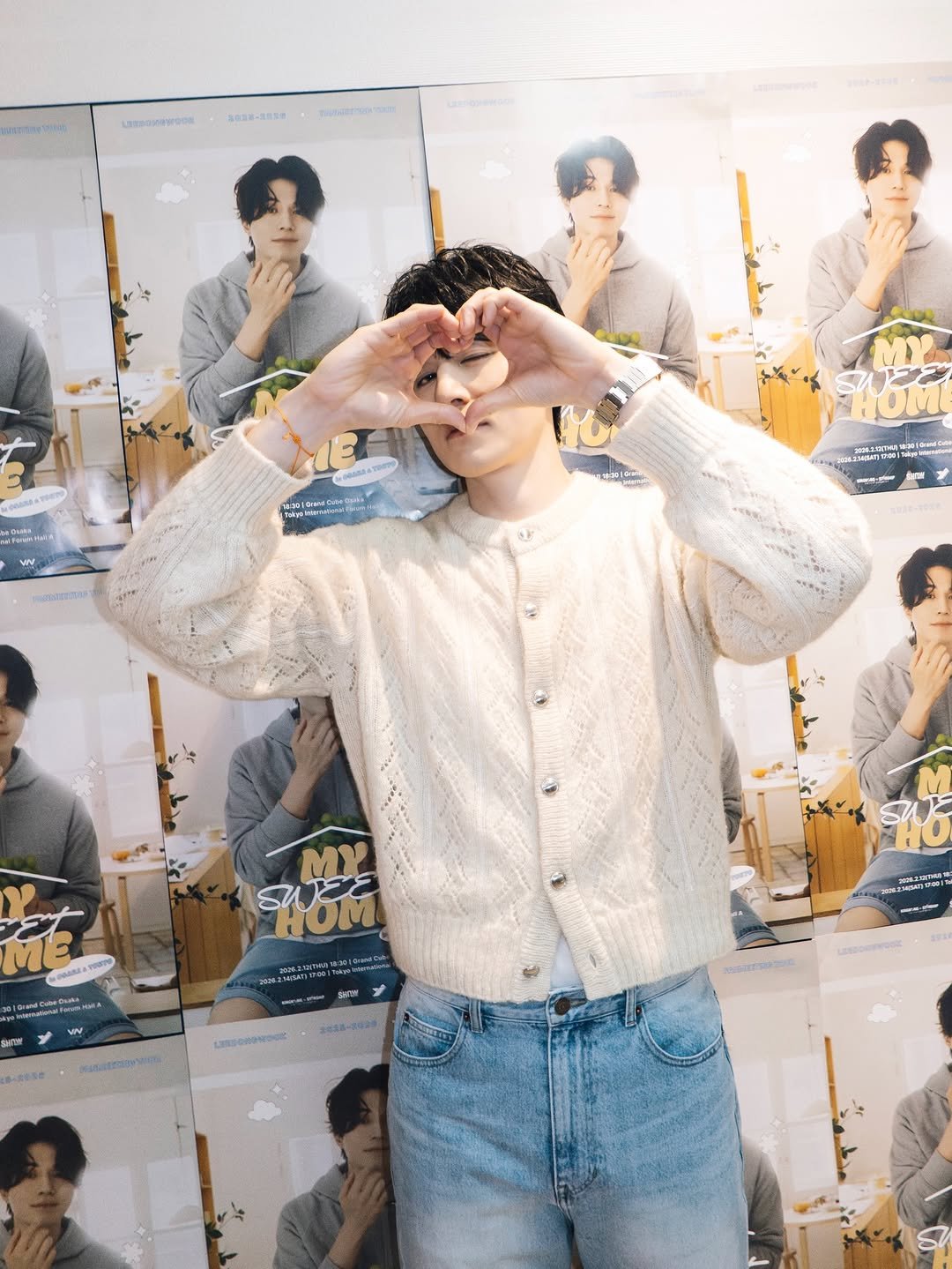 Photo by 이동욱 (Official_Instagram) on February 14, 2026. May be an image of one or more people, bangs, heart, bolo tie, top and text.