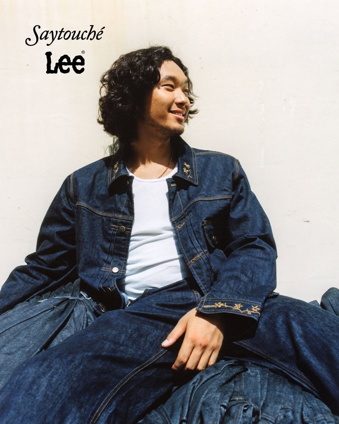 Photo shared by Lee Jeans KOREA on September 03, 2025 tagging @say_touche. May be an image of 1 person, magazine and text that says 'Saytouché Lee'.