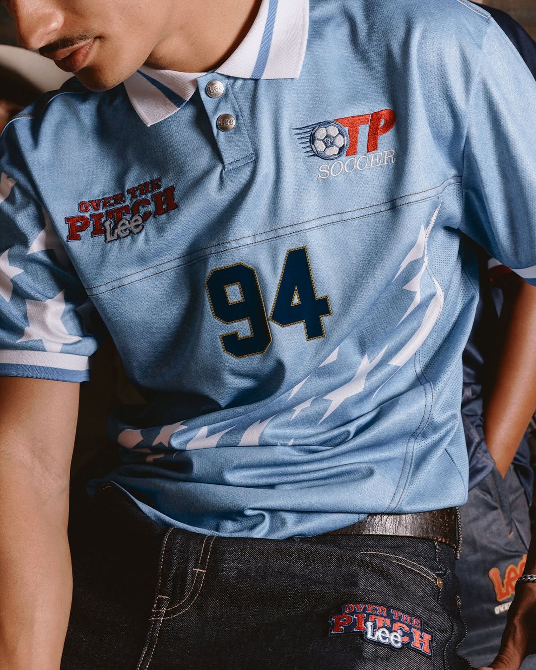 Photo shared by Lee Jeans KOREA on April 26, 2026 tagging @over_the_pitch. May be an image of sportswear and text.