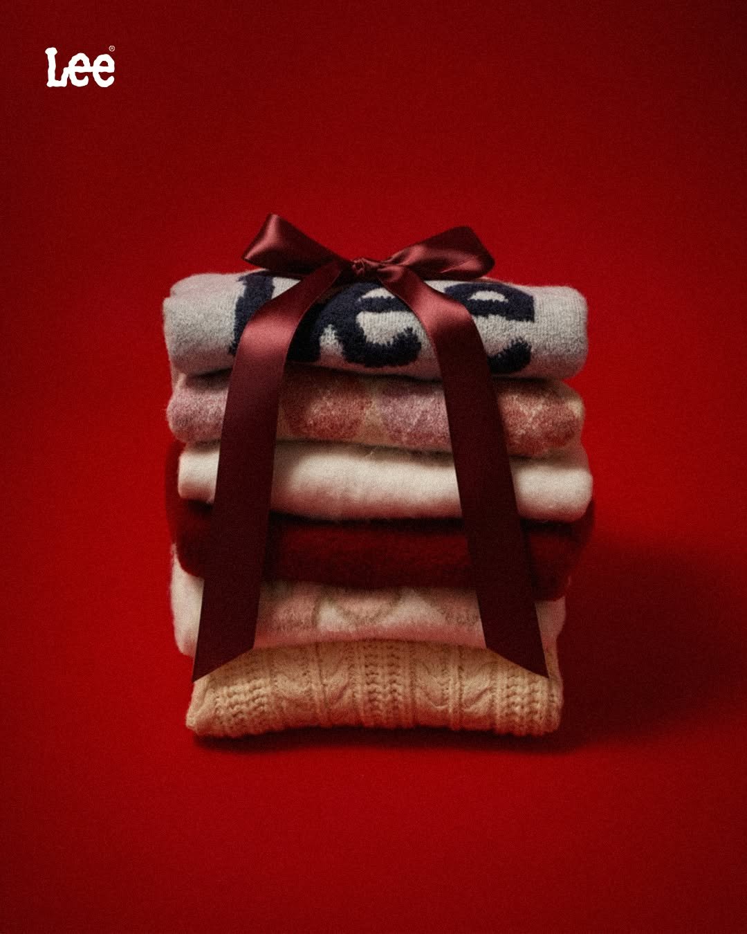 Photo by Lee Jeans KOREA on December 07, 2025. May be an image of blanket, sweater, diaper, poster and text.