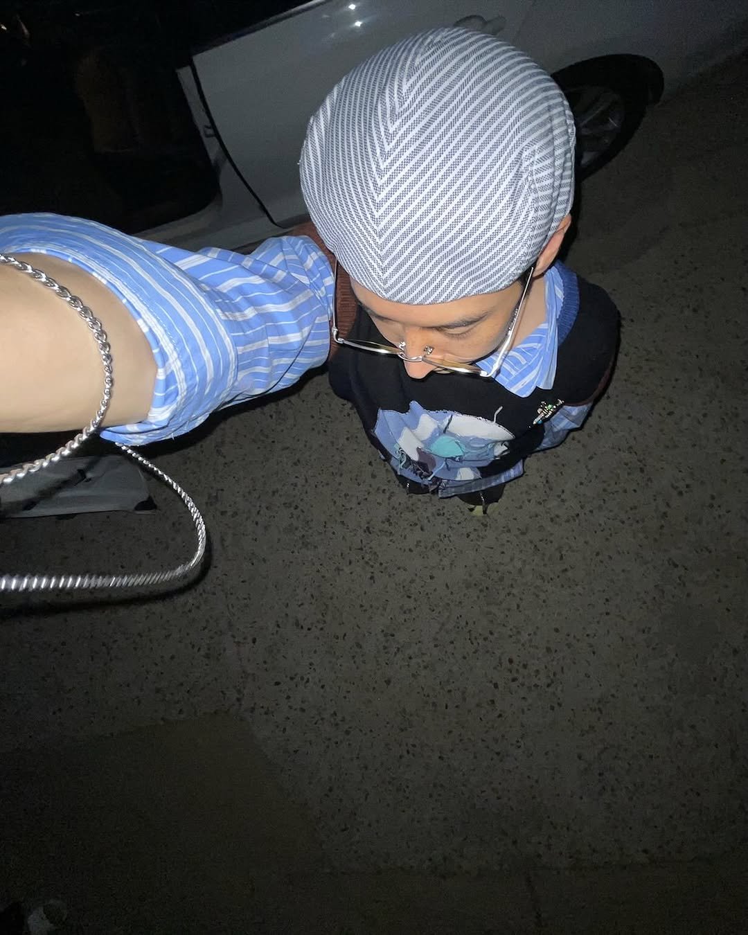 Photo by 이제훈 on December 01, 2025. May be an image of hat, night and text.