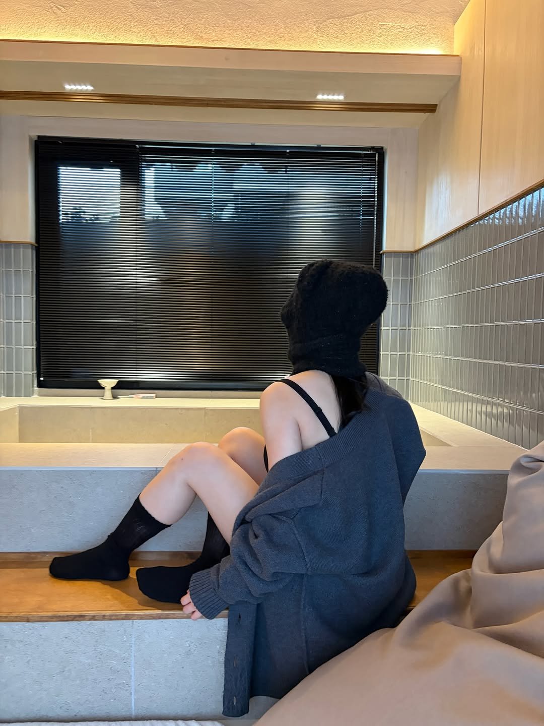 Photo shared by 이유데이 on December 30, 2025 tagging @yoobohwa, and @leeyooday. May be an image of bath robe, bathtub, shower, robe, face mask and text.