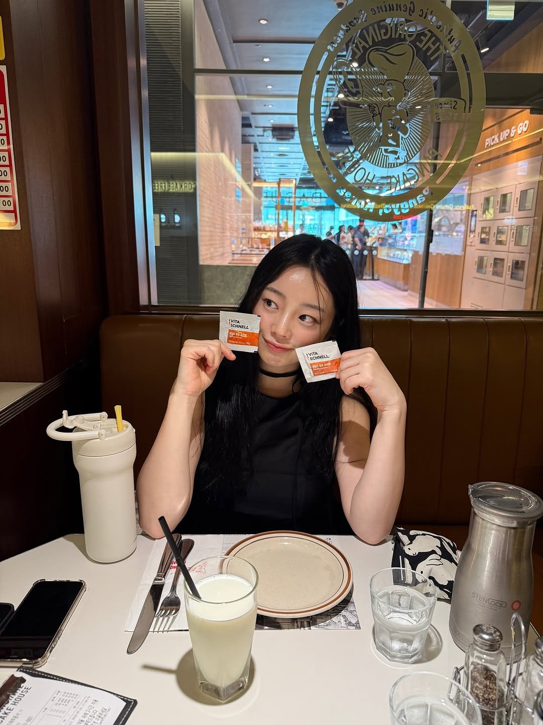 Photo shared by 이유데이 on August 10, 2025 tagging @yoobohwa, and @leeyooday. May be an image of 1 person, drink and text.