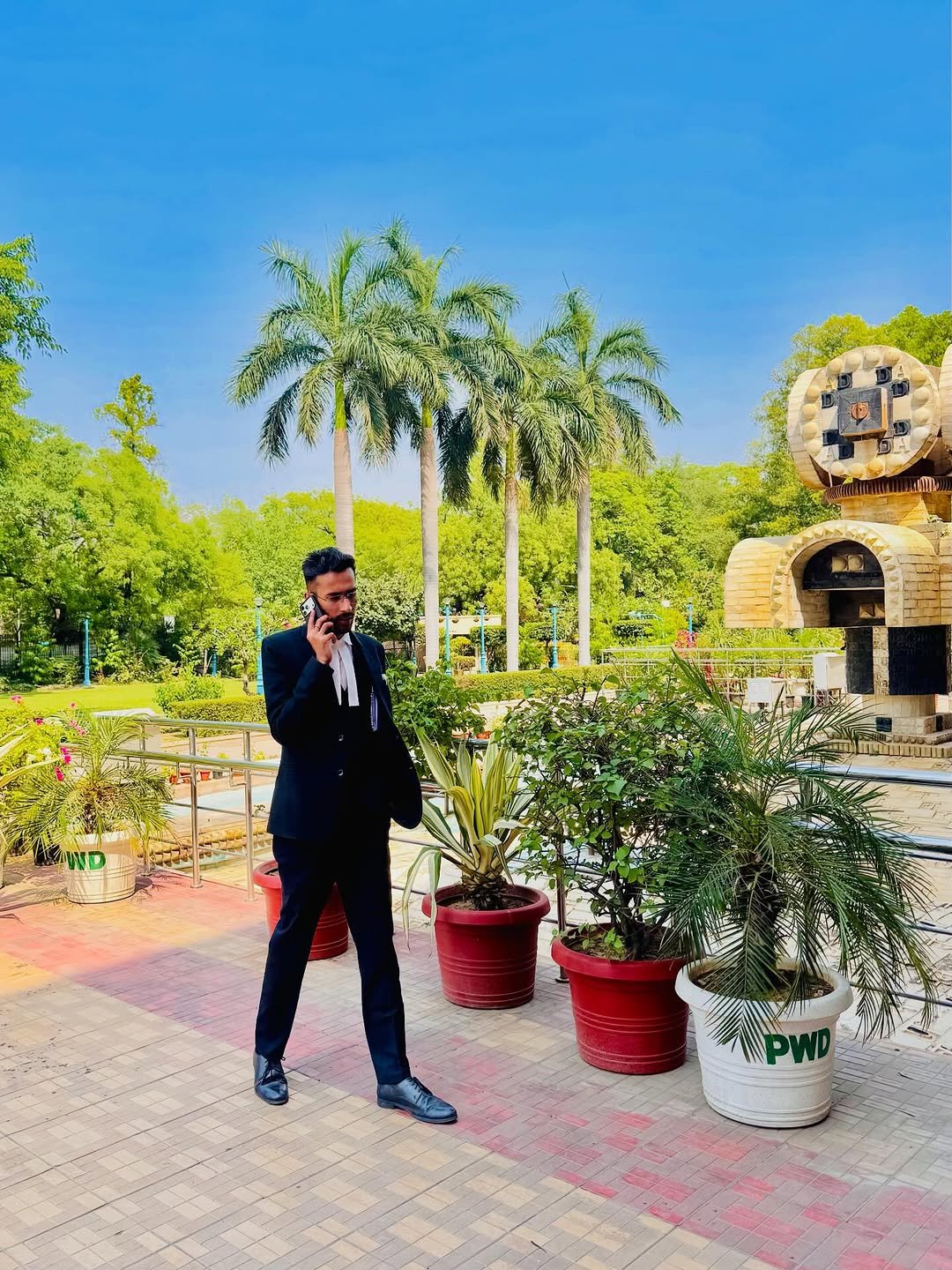 Photo by Advocate Umar Ali in Delhi High Court. May be an image of dinner jacket, blazer, suit, outdoors and text.