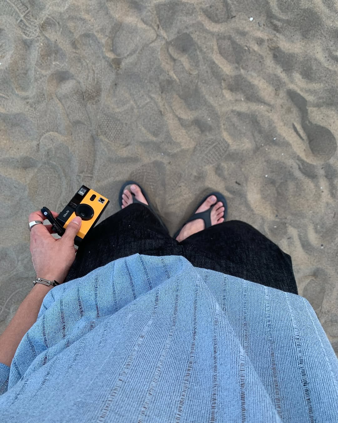 Photo by 규민_르니던 on July 17, 2025. May be an image of 1 person, beach and text.