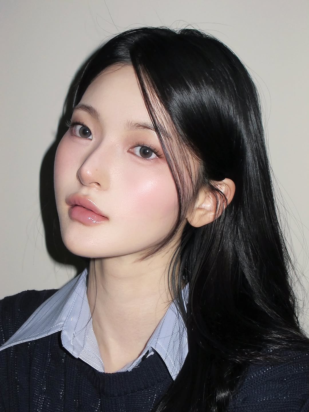 Photo shared by 렌즈미 LENSME Official on November 06, 2025 tagging @iaammzia. May be a closeup of one or more people, hair, makeup and text.