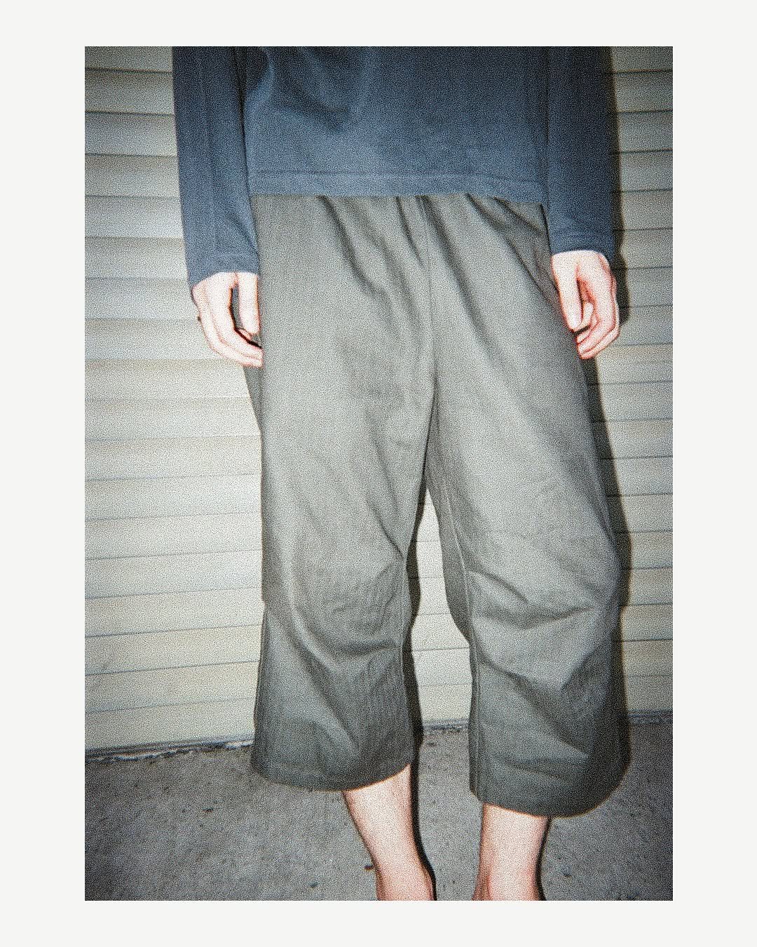 Photo by LES on August 26, 2025. May be an image of 1 person, sweatpants and text.