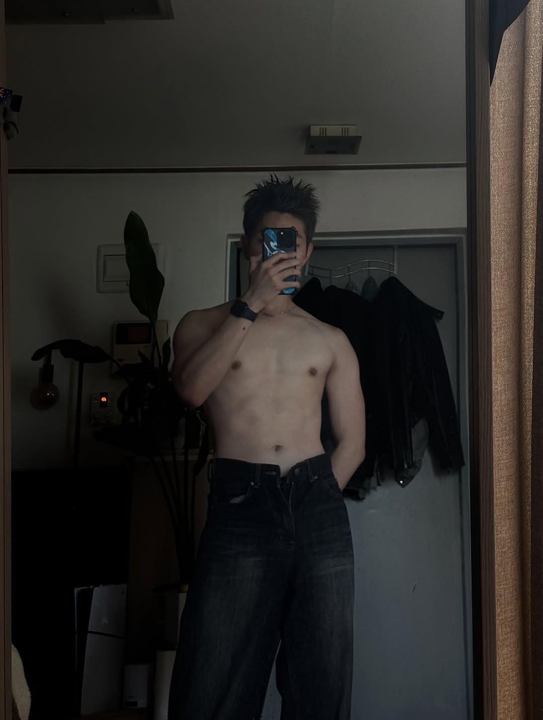 Photo by 륜Ryan on September 12, 2025. May be an image of 1 person, mirror, sweatpants and text.