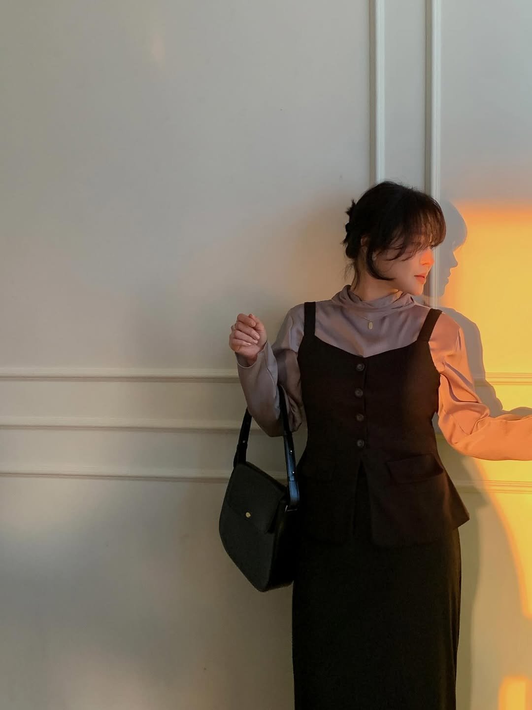 Photo by 레벨제이 on December 13, 2025. May be an image of overcoat, blazer, dress and text.