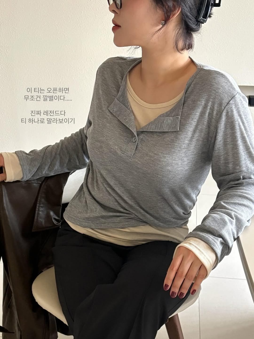 Photo by 레벨제이 on August 26, 2025. May be an image of 1 person, hair, cardigan, top, sweatpants and text.