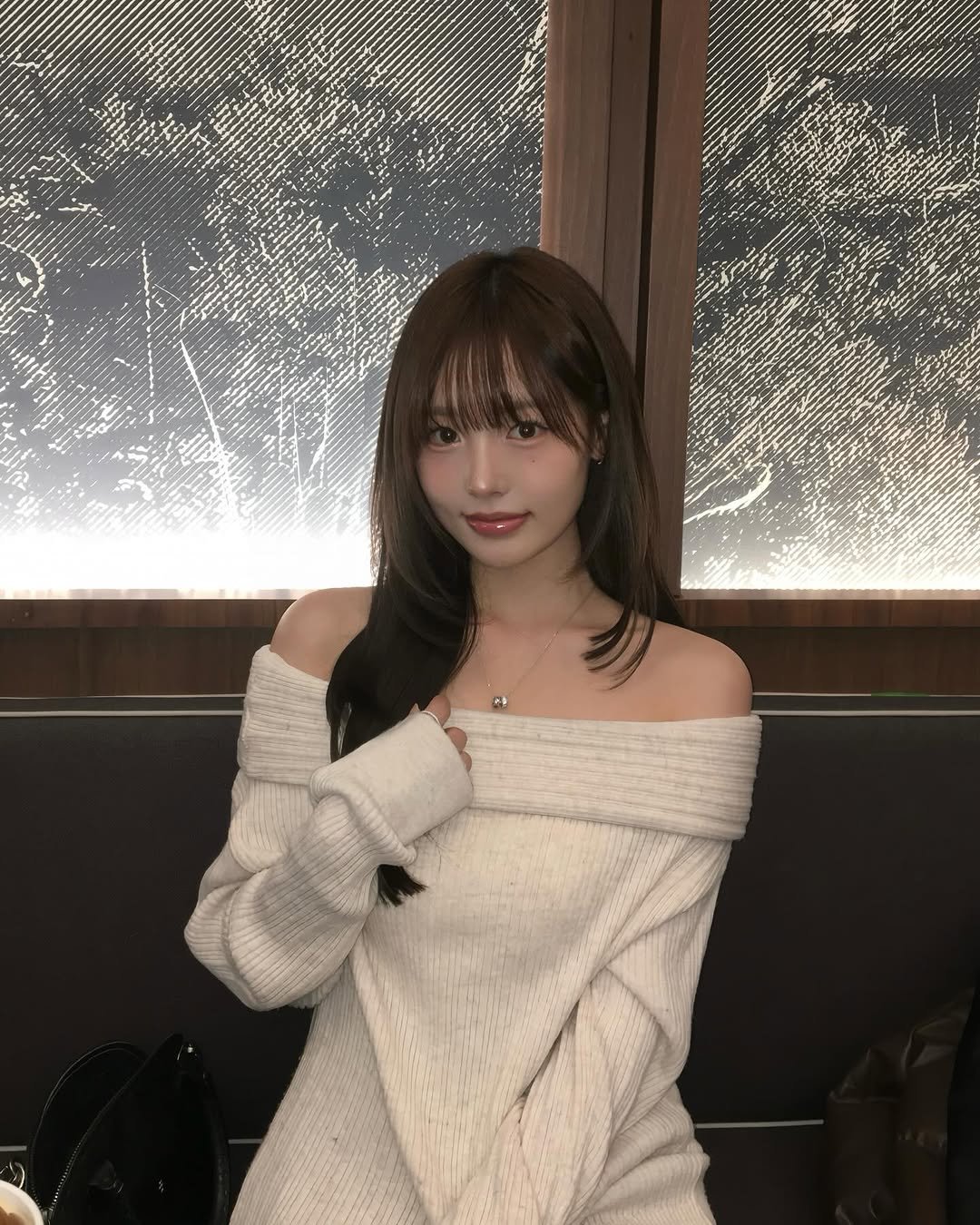 Photo by 리향 on December 24, 2025. May be an image of one or more people, hair, sweater, top, turtleneck and text.