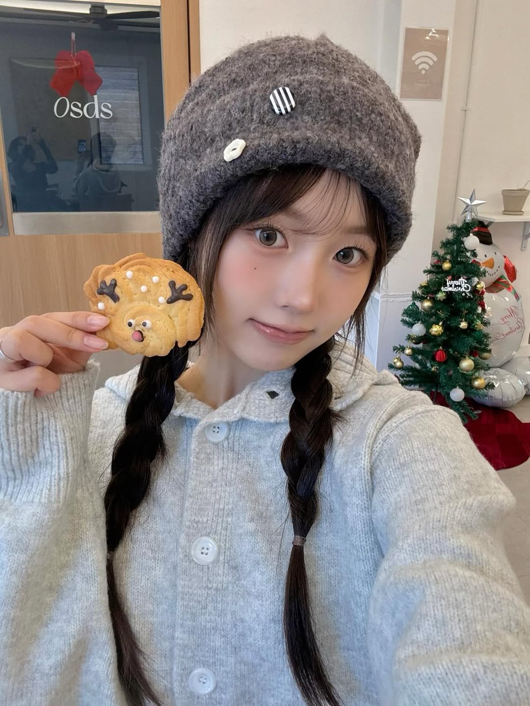 Photo by 리향 on December 03, 2025. May be an image of one or more people, braids, hat and text.