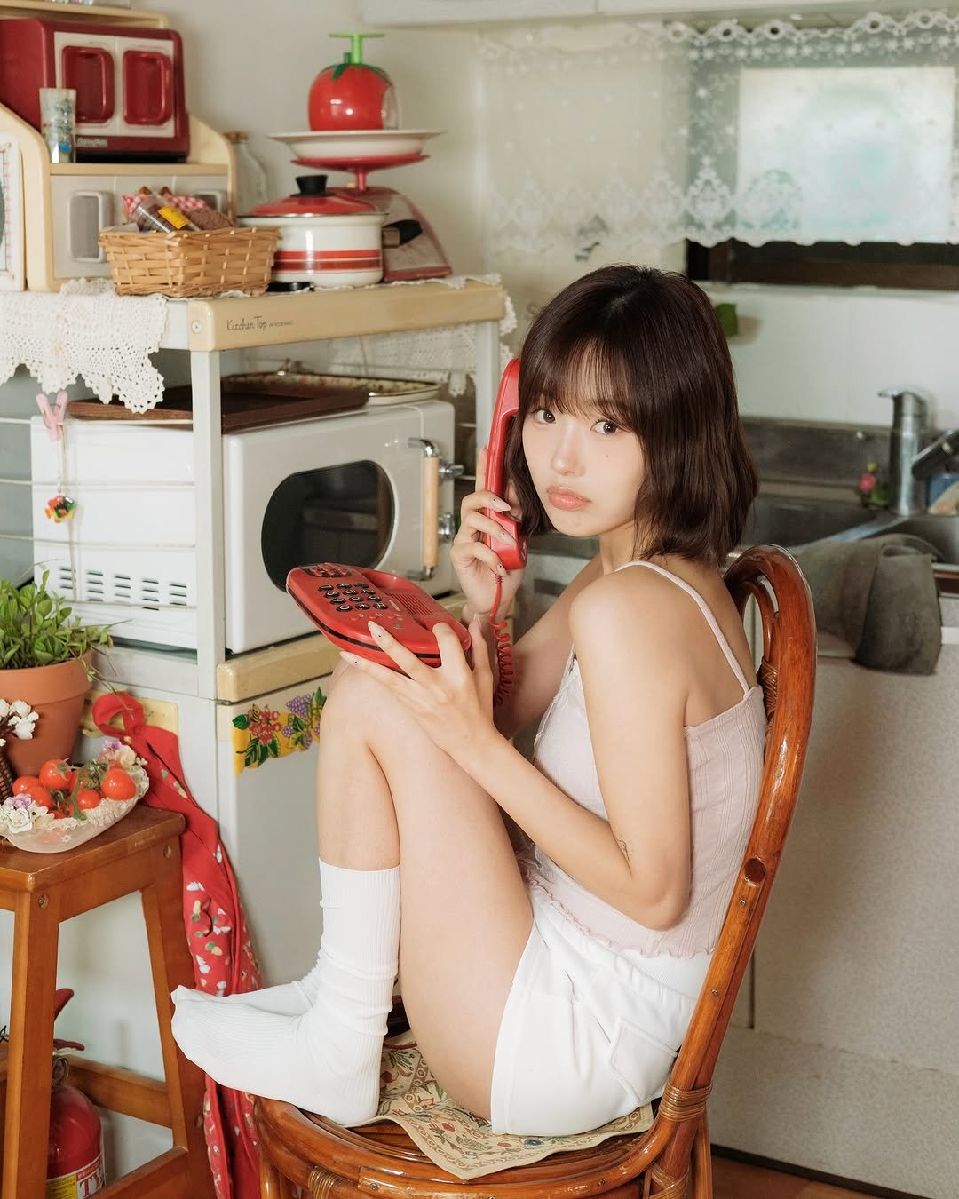 Photo shared by 리향 on November 05, 2025 tagging @dearie_moment. May be an image of sleepwear, miniskirt and text.