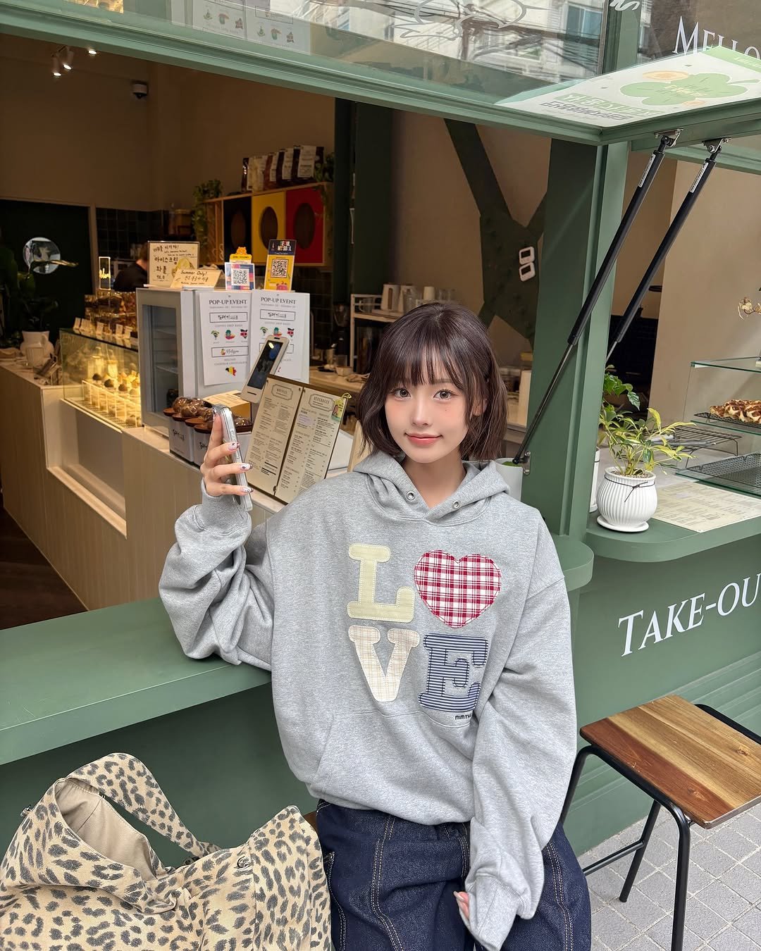 Photo shared by 리향 on September 26, 2025 tagging @mimthewardrobe. May be an image of 1 person, duffle coat, parka, sweatshirt, top, cornflower and text.