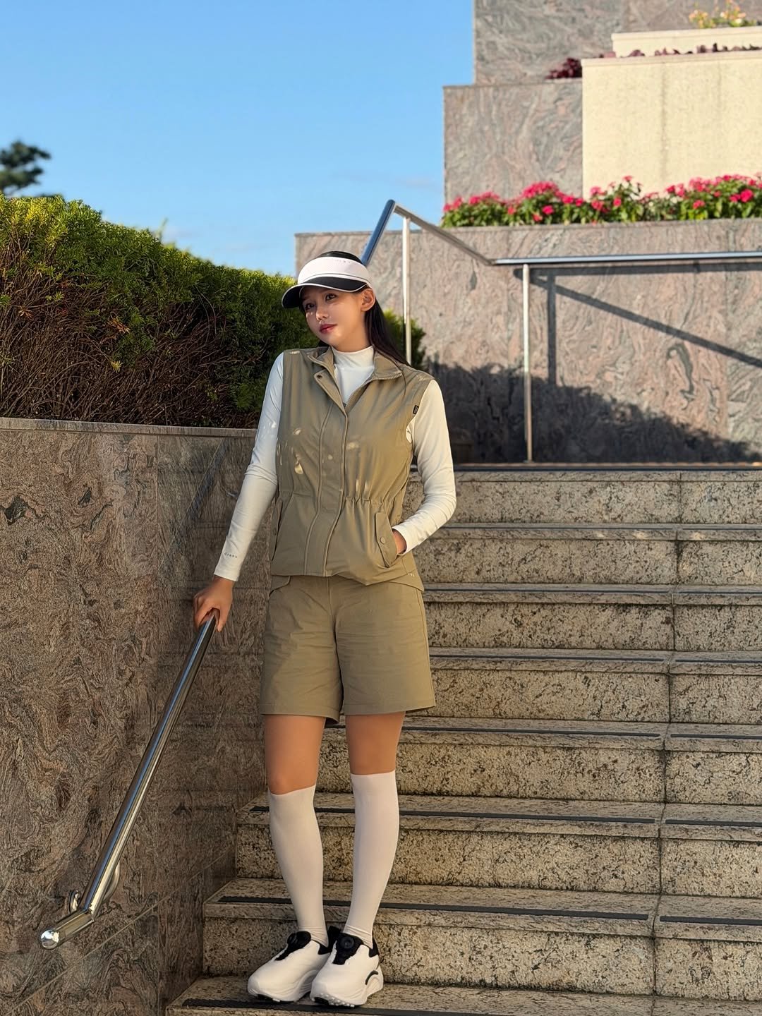 Photo shared by Lily on October 30, 2025 tagging @healcreekgolf. May be an image of golf, pants, miniskirt, sock, racket, beret, golf course and text.