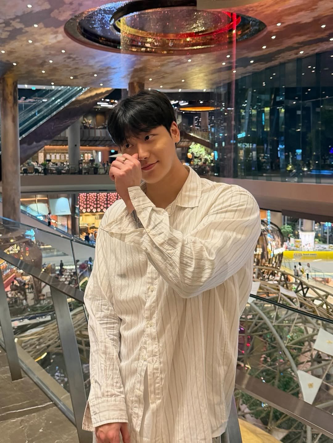 Photo by 종민 on April 16, 2026. May be an image of one or more people, hair, top, sweater and text.