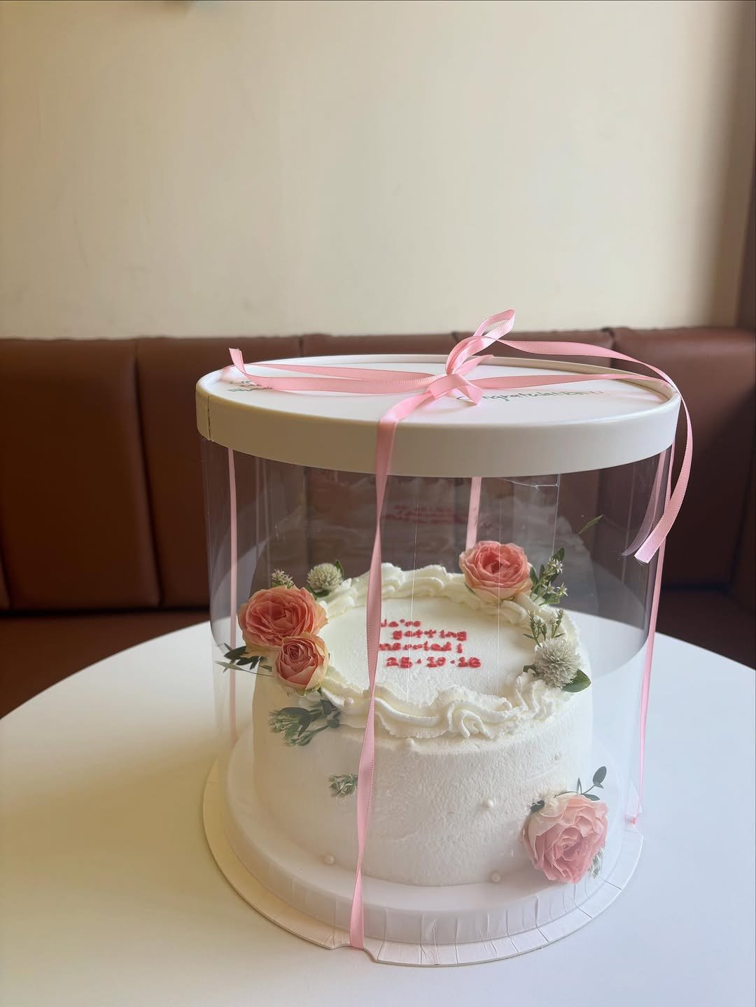 Photo by Littlemoresweet on October 31, 2025. May be an image of wedding cake, baby's-breath, prairie gentian and text.