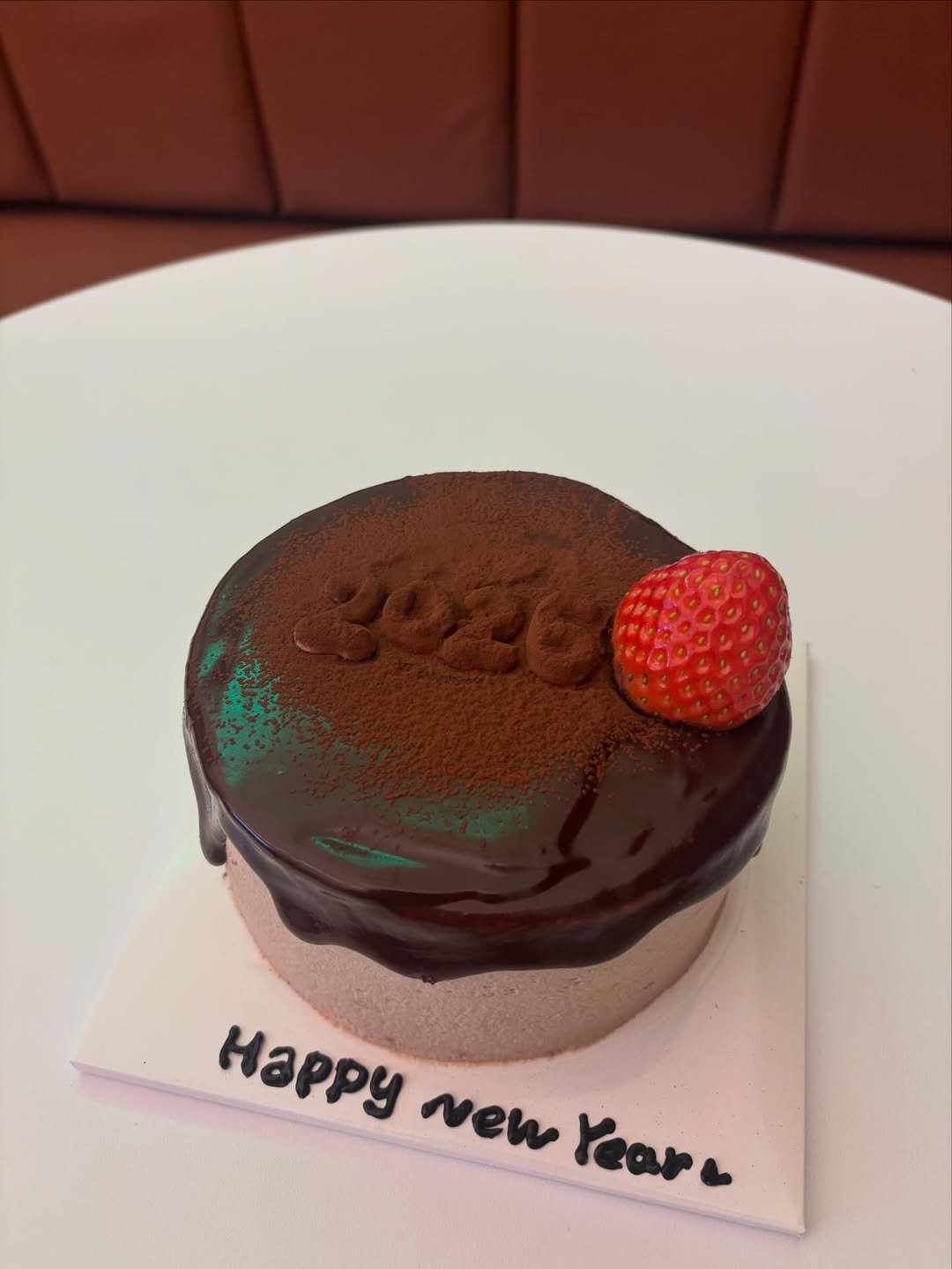 Photo by Littlemoresweet on December 29, 2025. May be an image of strawberry, chocolate mousse, chocolate cake and text that says 'наРру New Yeara'.