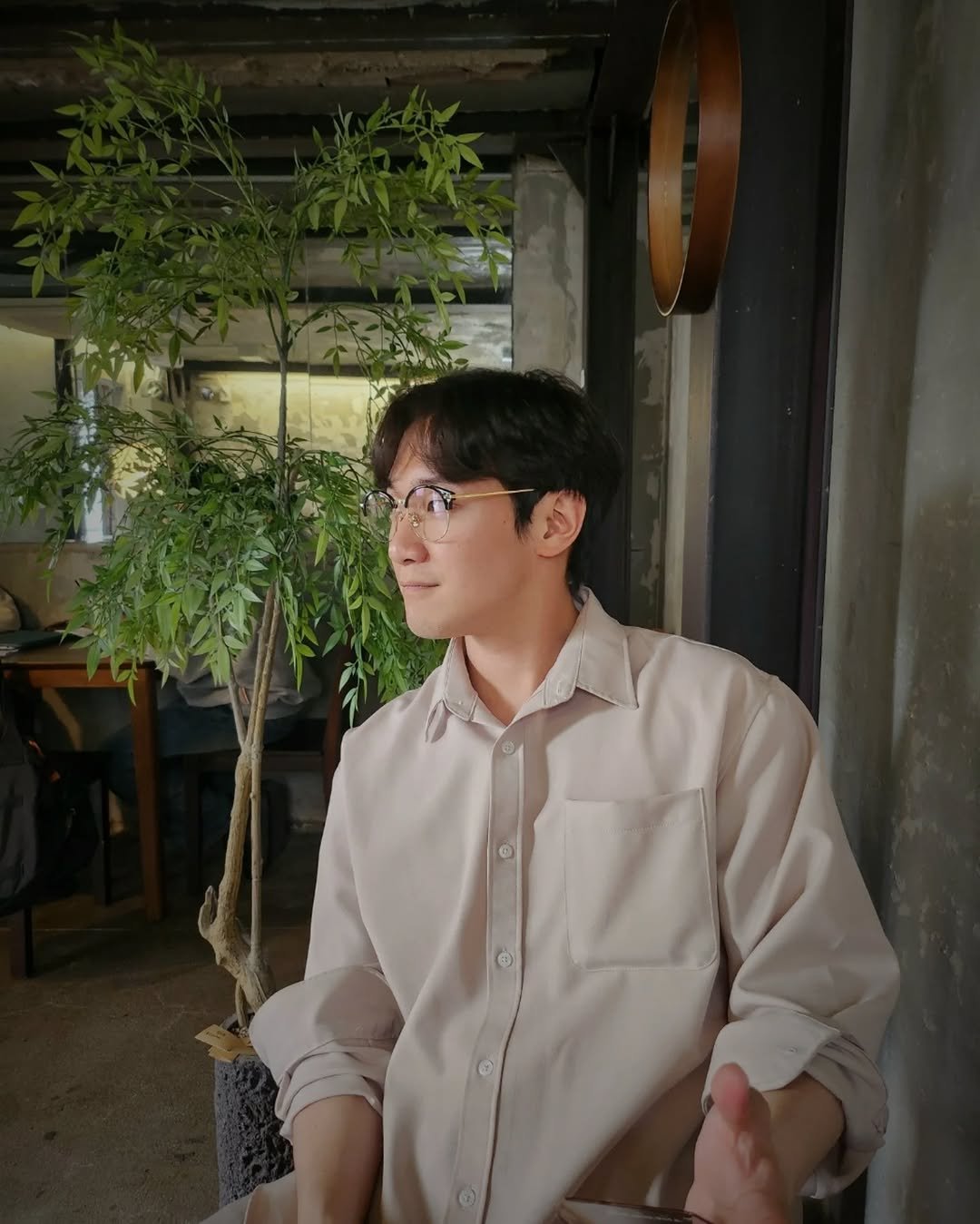 Photo by 임지운 on May 20, 2025. May be an image of 1 person, plant and text.