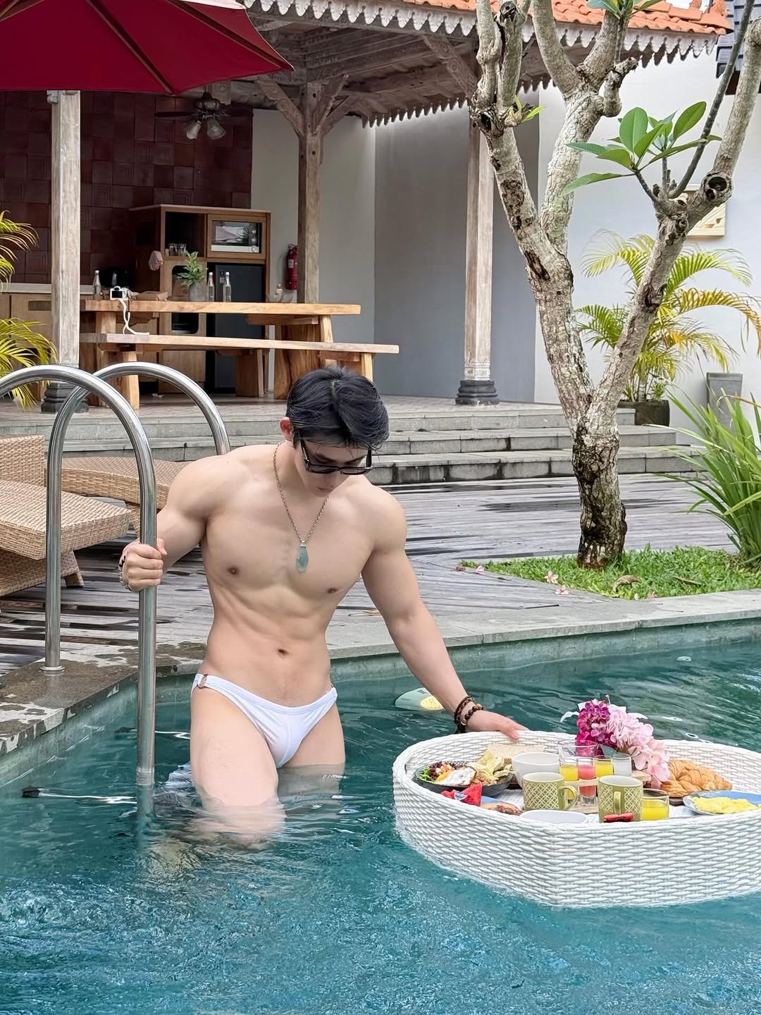 Photo by DJ_yihan🐉 on March 24, 2026. May be an image of sarong, pool and text.